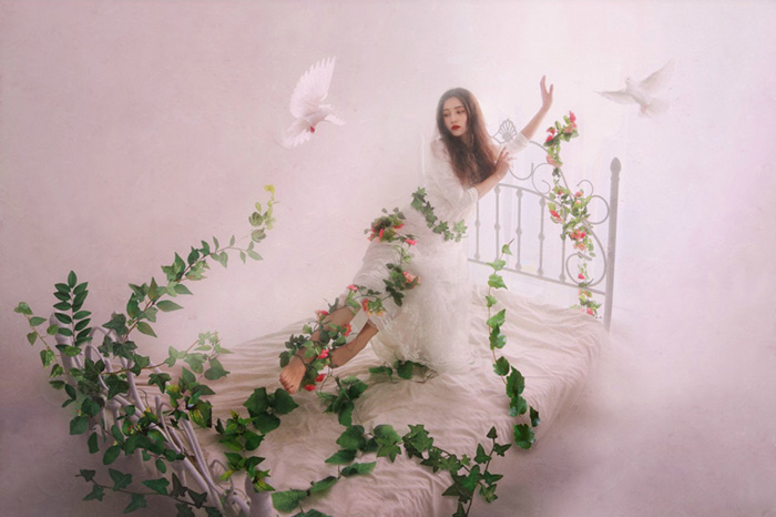 PS合成驾着花床飘在云里的仙女缩略图